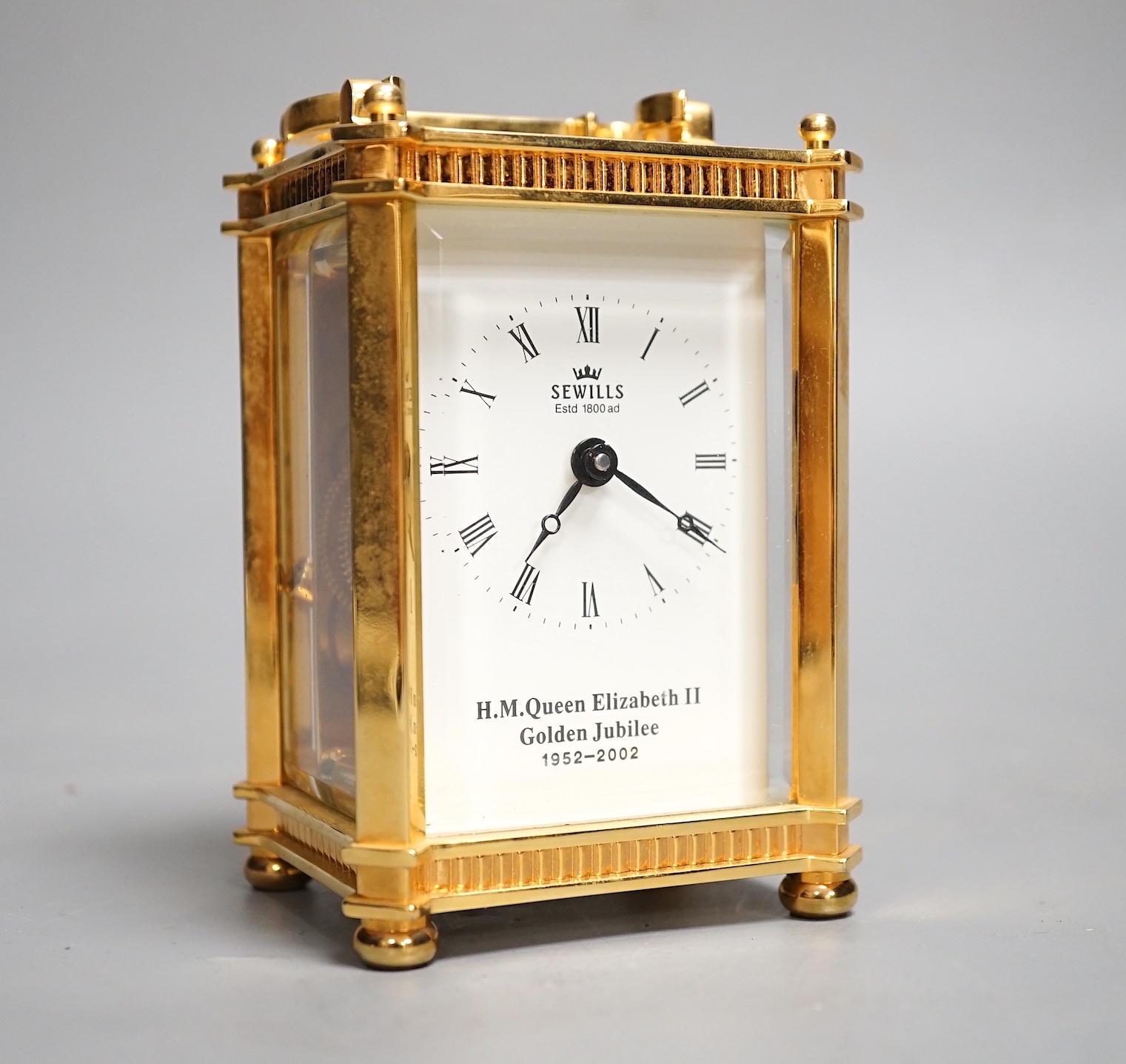 A Golden Jubilee commemorative carriage timepiece, retailed by Sewills - 12cm high